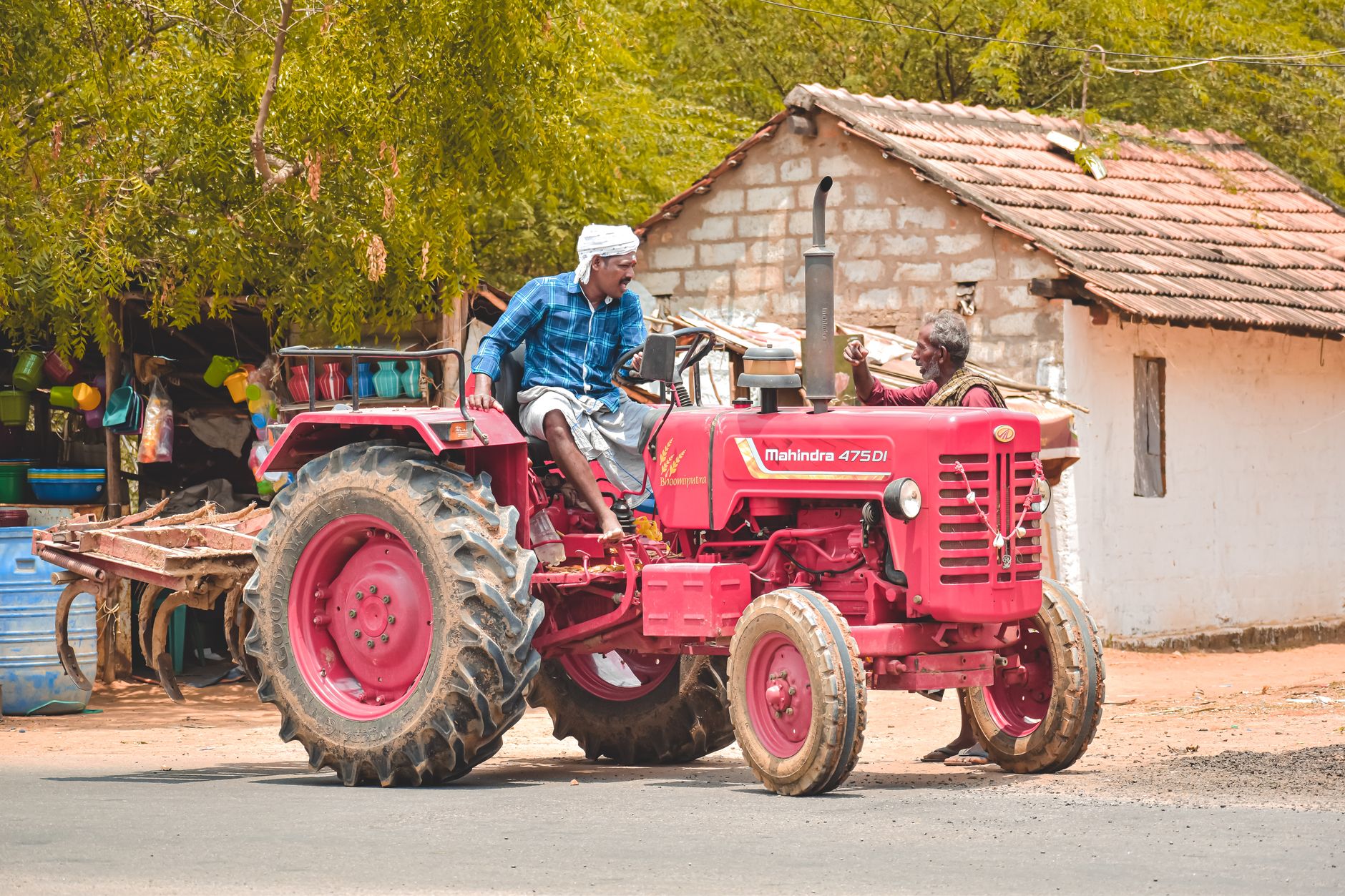 John Deere tractor working in an Indian field